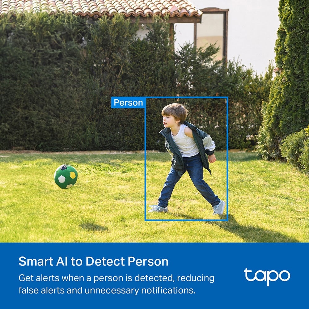 Child playing soccer in garden with blue detection box around person, green ball in lower left, hedges and gazebo in background